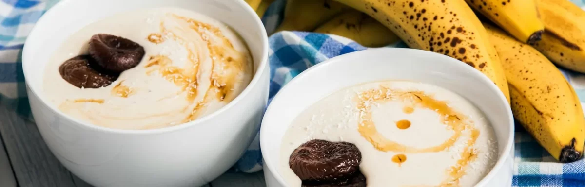 Small bowl of yogurt and banana prepared as a bedtime snack
