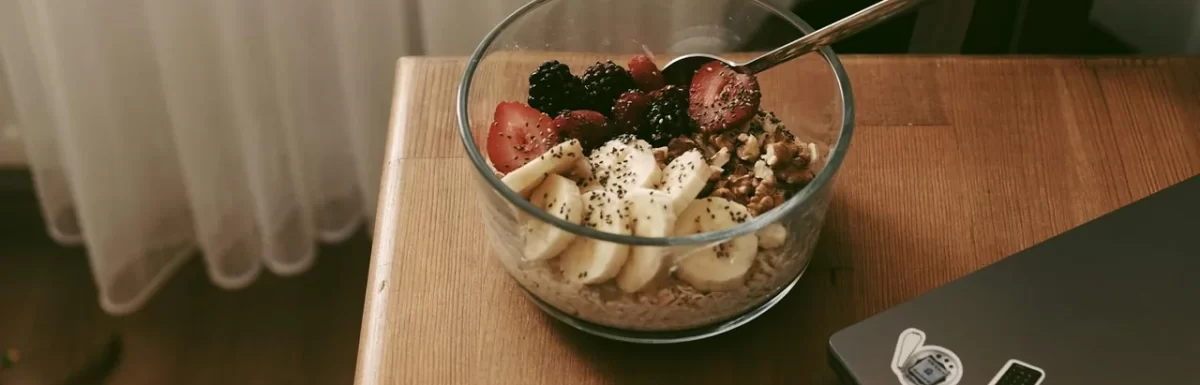 Bowl of oats topped with berries and chia seeds