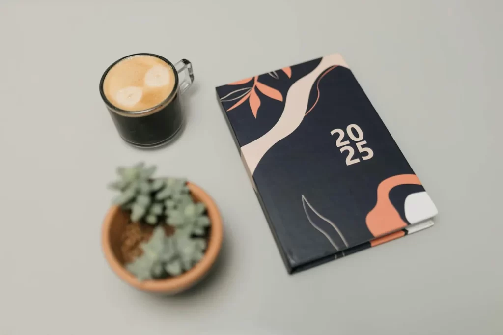Planner, coffee, and walking shoes laid out for a balanced day