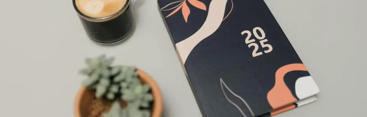 Planner, coffee, and walking shoes laid out for a balanced day