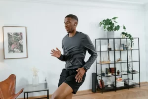 Person doing a low-impact cardio workout in a living room