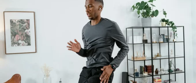Person doing a low-impact cardio workout in a living room