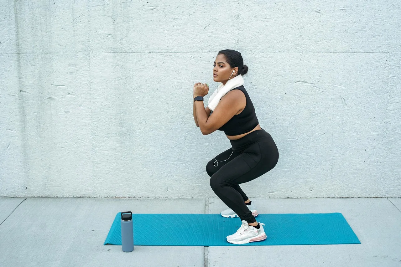 Woman exercising on a mat during a no-jumping workout