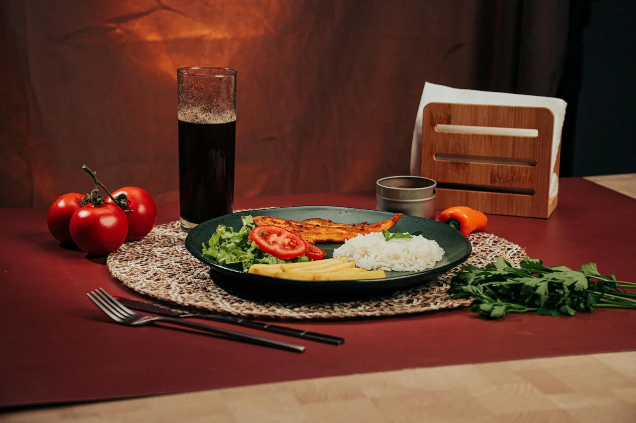 Balanced dinner with protein, rice, and vegetables on a dinner table