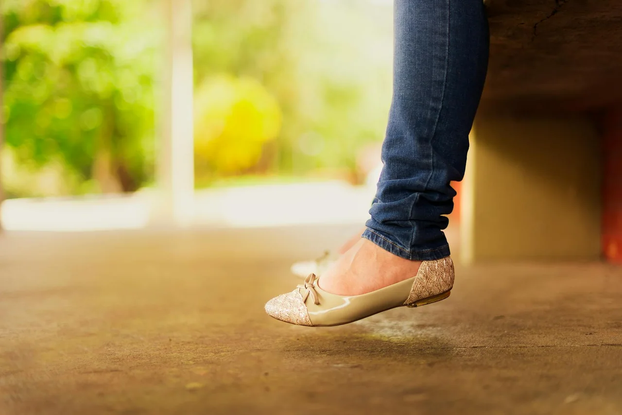 Walking shoes placed by the front door as a habit reminder