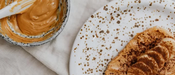 Banana and peanut butter packed as a simple pre-workout snack